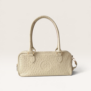 LEONOR LUXX LUNARES · Cartera de cuero natural