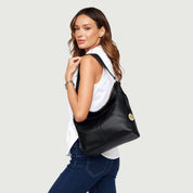 Zipp Bolso de cuero natural — Carola Guzmán, hecho a mano en Chile